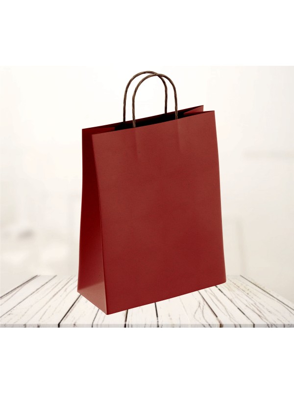 Redeča vrečka z rjavim ročajem